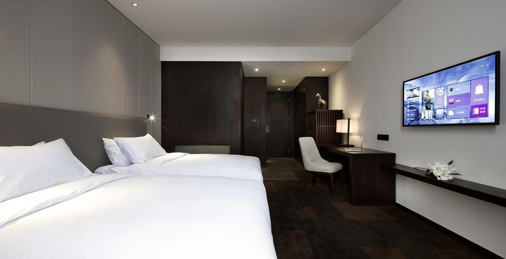 Ease House Luoyang Hotel Луоян Стая снимка